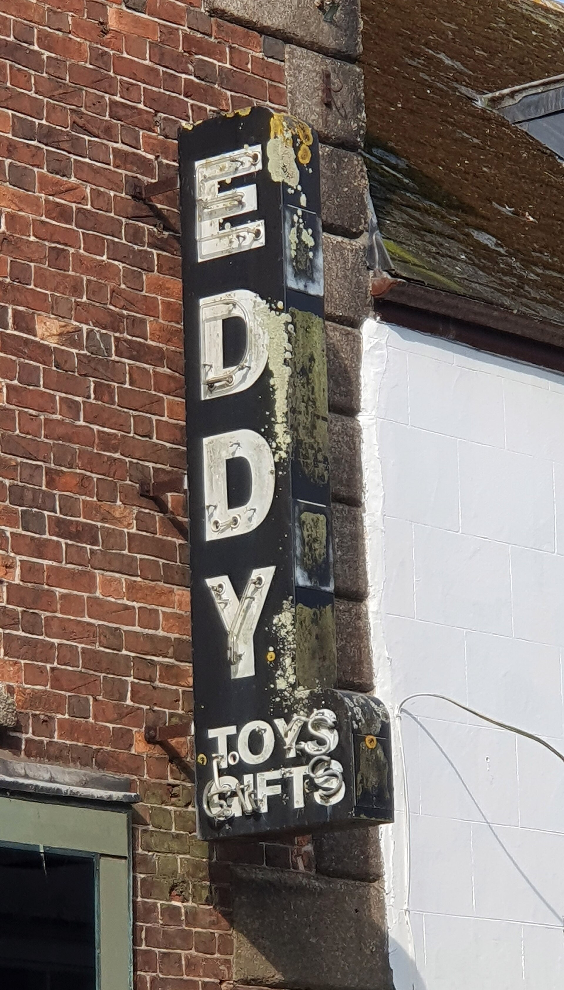 Directional photograph — not a Desi Signs install